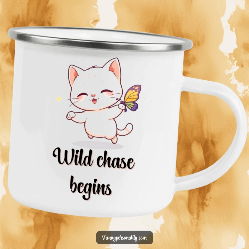 Funny camping mug featuring a playful cat character chasing a sparkling butterfly, designed for outdoor adventures and cheerful sipping.