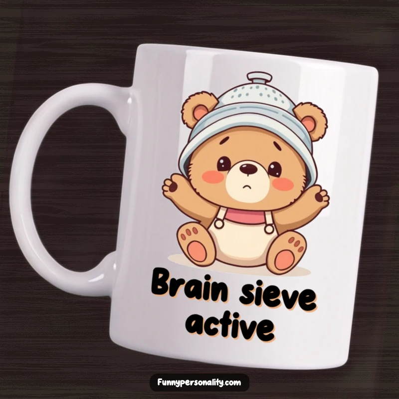 Funny Mug featuring a clumsy bear cub wearing a colander as a hat, looking utterly confused and endearingly lost.