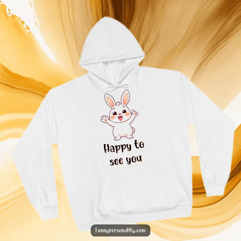 Funny and cozy hoodie featuring a cheerful cartoon bunny waving happily with a big smile, bringing warmth and joy.