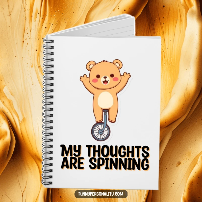 Funny bear notebook with a cute character thrillingly riding a unicycle and waving, perfect for jotting down funny thoughts.